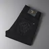 Jeans Impresos Novedad Primavera y Otoño 2026 para Hombre, Estilo Europeo de Moda, Corte Ajustado, Pantalones Skinny, Elásticos, Negro Puro, Casual