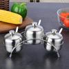 Juego de tarros para condimentos de acero inoxidable 304 estilo europeo Tres sabores y cuatro sabores Botella para condimentos con cuchara Caja para condimentos de uso doméstico Utensilios de cocina