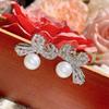 Camellia Corazón de Niña Nicho Exquisitas Cuentas Traje Diseño de Lazo para Mujer Circonita Microincrustada Anillo de Perla Imitación para Mujer