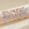 Pulseira Aberta Estrela do Mar Metalizada Plissada Transfronteiriça Europeia e Americana, Pulseira Exquisita da Moda Metálica, Joia Personalizada de Alto Padrão