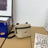 Bolso Cruzado de Lona de Marca de Moda para Mujer 2025 Nuevo Nicho Personalizado Bolso para Teléfono Mochila Pequeña Casual para Hombre Bolsa para Auriculares y Llaves