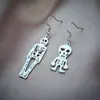Europa y Estados Unidos moda nueva transfronteriza personalidad creativa asimétrico zombie acero inoxidable colgante joyería pendientes joyería