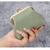 Fabricante directo de monederos vintage de clip, monederos de mujer de piel sintética, mini bolsas para guardar monedas y llaves al por mayor