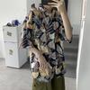Camisa de manga corta de verano para hombre, estilo vintage, con estampado divertido de cabeza y personalidad, de marca coreana, holgada y a la moda.