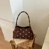 Bolsa de antebraço feminina, nova coleção de outono 2026, de alta qualidade, retrô e estilosa, adequada para o trajeto diário, com textura de camurça e design de bolinhas