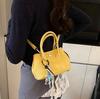 Bolso bandolera portátil explosivo de moda de nicho para mujer, novedad de 2025, bolso bandolera sencillo y combinable, bolso bandolera elegante y moderno.