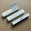 Venda Quente Mercado Americano tamanho pequeno letterpress 7 compartimentos porta-pílulas grau alimentício sete compartimentos porta-pílulas com Braille porta-pílulas para uma semana