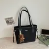 Bolsa tote única, fashion, casual, texturizada, simples, novo modelo de verão 2026, bolsa de ombro feminina com design de nicho
