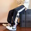 Pantalones largos de pana con forro polar para hombre, otoño e invierno, estilo Hong Kong de alta costura moderno, joggers deportivos de peso pesado, pantalones casuales con puños elásticos