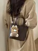Bolsa Balde de Mão com Design de Nicho Estilo Coreano para Mulheres Nova Moda Primavera 2026 Bolsa de Ombro Transversal Simples e Elegante
