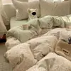 Juego de ropa de cama de textiles para el hogar de Nantong, juego de cuatro piezas, sábana de algodón lavado amigable con la piel, funda de edredón, sábana bajera, juego de tres piezas para camas de dormitorios estudiantiles