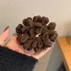 Corda de cabeça Escape Princess outono e inverno pelúcia macarrão instantâneo anel de cabelo intestino grosso rabo de cavalo baixo faixa de borracha de alta qualidade capa de couro para meninas