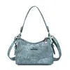 Nuevo bolso de hombro de cuero suave de alta gama transfronterizo para mujeres de mediana edad, bolso de mano de gran capacidad, bolso cruzado, bolso de mamá elegante