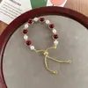 Collar Transfronterizo de Perlas Rojas para Mujer, Cadena Clavicular Retro de Alta Gama, Joyería de Vidrio Perlado de Lujo Ligero de Nicho al por Mayor
