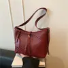 Bolso de mujer con patrón tejido vintage transfronterizo, nuevo popular de principios de otoño 2026, versátil, de gran capacidad, para hombro y cruzado, tipo tote