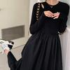 Vestido de manga larga de punto calado estilo Hepburn para mujer, nuevo diseño de primavera y otoño, temperamento nicho, corte entallado adelgazante.