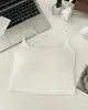 Camisola de color brillante con espalda descubierta y tirantes cruzados para mujer, con almohadillas en el busto y diseño hueco, adecuada tanto para llevar por dentro como por fuera como una prenda integrada