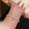 Pulsera de Plata de Ley S925 Perla Shijia Redonda Perro Globo Cuerda Elástica para Mujer Exquisita Versátil Gama Alta Linda