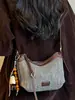 Bolsa tejida casual para mujer Shuai Mi Jia, nuevo estilo de otoño 2026, bolsa de paja, bolso de hombro y cruzado de moda nicho