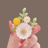 Nuevo broche de flores de alta gama para mujer, exquisito ramillete de margaritas, diseño de nicho, pasador antideslizante, accesorios personalizados