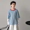 Ropa infantil sudadera para niños primavera y otoño 2026 nuevo modelo para niños mayores, top de manga larga, moderno y genial de otoño