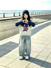 Conjunto de dos piezas de nuevo estilo para niña Otoño 2026: Conjunto de Sudadera Falsa de Dos Piezas y Jeans de Pierna Ancha para Niñas Mayores, Conjunto de Dos Piezas de Dibujos Animados y Moderno