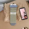 Calcetines largos de otoño sin costuras estilo coreano ins de moda a rayas con bloques de color y bordes enrollados, calcetines hasta la mitad de la pantorrilla para niñas, estilo universitario, calcetines holgados que reducen la edad