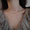 Collar clásico de cadena de clavícula de perlas de moda ligero de lujo para mujer con diseño de nicho 2023 nuevo collar simple y elegante