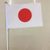 Bandeira de Mão da Copa do Mundo de 2026 EUA Canadá México em Estoque Bandeira EUA Canadá México Bandeira de Mão em Estoque