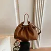 Bolso plisado para ir al trabajo Estilo coreano Nuevo Nube 2026 Cruzado versátil Súper caliente Nicho Cubo Bolso retro de moda para mujer