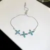 Pulsera de flor corazón de circón súper brillante estilo coreano, sensación de lujo ligero de alta gama, joyería versátil exquisita y elegante para el día a día de las mujeres