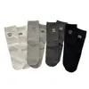 Nuevos calcetines de otoño e invierno estilo coreano ins, a media pantorrilla, con bordado de cachorro de dibujos animados y la letra AB en el talón, asimétricos para pies izquierdo y derecho