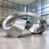 Escultura de Banda de Möbius de Acero Inoxidable Plaza Exterior Anillo Metálico Cepillado Adorno con Forma de Anillo Paisajismo de Jardín Inmobiliario Personalizado