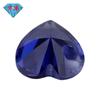Huagang Gem Agujero Único Derecho Forma de Corazón Zircón Azul Tansang Piedra Desnuda Venta al por Mayor Sintético Gema Azul Tansang