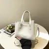 Bolsa Pequena Feminina Super Tendência 2026 Nova Bolsa de Mão de Nicho Bolsa Estilo Cesta Bolsa de Ombro Transversal Versátil Casual Estilosa