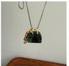 Blogger da Coreia do Sul com bolsa de obsidiana olho de tigre design colar cordão de uva corrente de suéter combinável para mulheres