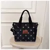 Bolso de mano de lunares elegante transfronterizo para mujer, nuevo bolso casual de tela Oxford de gran capacidad para el hombro y cruzado