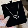 Collar con Anillo Doble de Corazón Estilo Coreano Nuevo Accesorios para Mujer Diseño de Nicho Colgante Entrelazado Versátil Cadena para Clavícula de Acero de Titanio