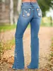 Jeans acampanados para mujer transfronterizos europeos y americanos con intrincado bordado tridimensional de margarita, pantalones vaqueros ajustados para mujer con microcampana