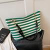 2025 Nova Bolsa Tote Listrada de Ombro Único Moda Coreana Versátil Tecido Tricô Bolsa de Mão Preguiçosa Versátil Bolsa Feminina