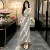 Vestido a rayas de moda para mujer, nuevo estilo verano 2026, elegante y entallado en la cintura, elegante vestido largo sin tirantes y sin mangas