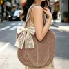 Bolso de hombro tejido casual para mujer, nuevo bolso de paja calado, bolso de mano casual estilo estudiante para playa