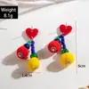 Brincos de Natal Europeus e Americanos Transfronteiriços Divertidos Coloridos Trançados com Bola de Pelo Contrastante Design de Nicho Brincos de Contas de Arroz para Mulheres