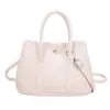 Bolso tipo cubo texturizado de nicho para mujer 2026 nuevo estilo coreano bolso de mano bolso de hombro casual diario chic moderno bolso pequeño