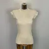 Ropa de Mujer Coreana de Dongdaemun para Exportación: Elegante, Moderno, Versátil, Corte Ajustado, Sexy, Femenino, Cuello Semi Alto, Tejido Sin Mangas