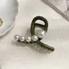 Pinza para el pelo de tiburón pequeño de perla popular en Internet Pinza para el pelo de mujer Pinza para el pelo de la parte posterior de la cabeza Pinza para el pelo semi-recogido Pinza de agarre Pinza de disco para el pelo Tocado