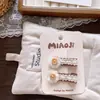 Pinzas para el cabello de tela hechas a mano en Dongdaemun, Corea, de cuadros marrones con lazo para niñas, Pinzas BB Geométricas Atadas a Mano en un Par