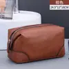 Bolsa de aseo de cuero retro de lujo ligero para hombres de oficina, bolsa de almacenamiento portátil para productos de cuidado de la piel y maquillaje