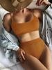 Traje de baño dividido nuevo 2025 para mujer, bikini sexy de color sólido europeo y americano, traje de baño cruzado de cintura alta, venta al por mayor de bikini