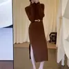 Vestido de punto liso de cuello alto para mujer, nuevo estilo coreano otoño e invierno 2025, elegante, adelgazante, casual, ajustado, con abertura, vestido largo